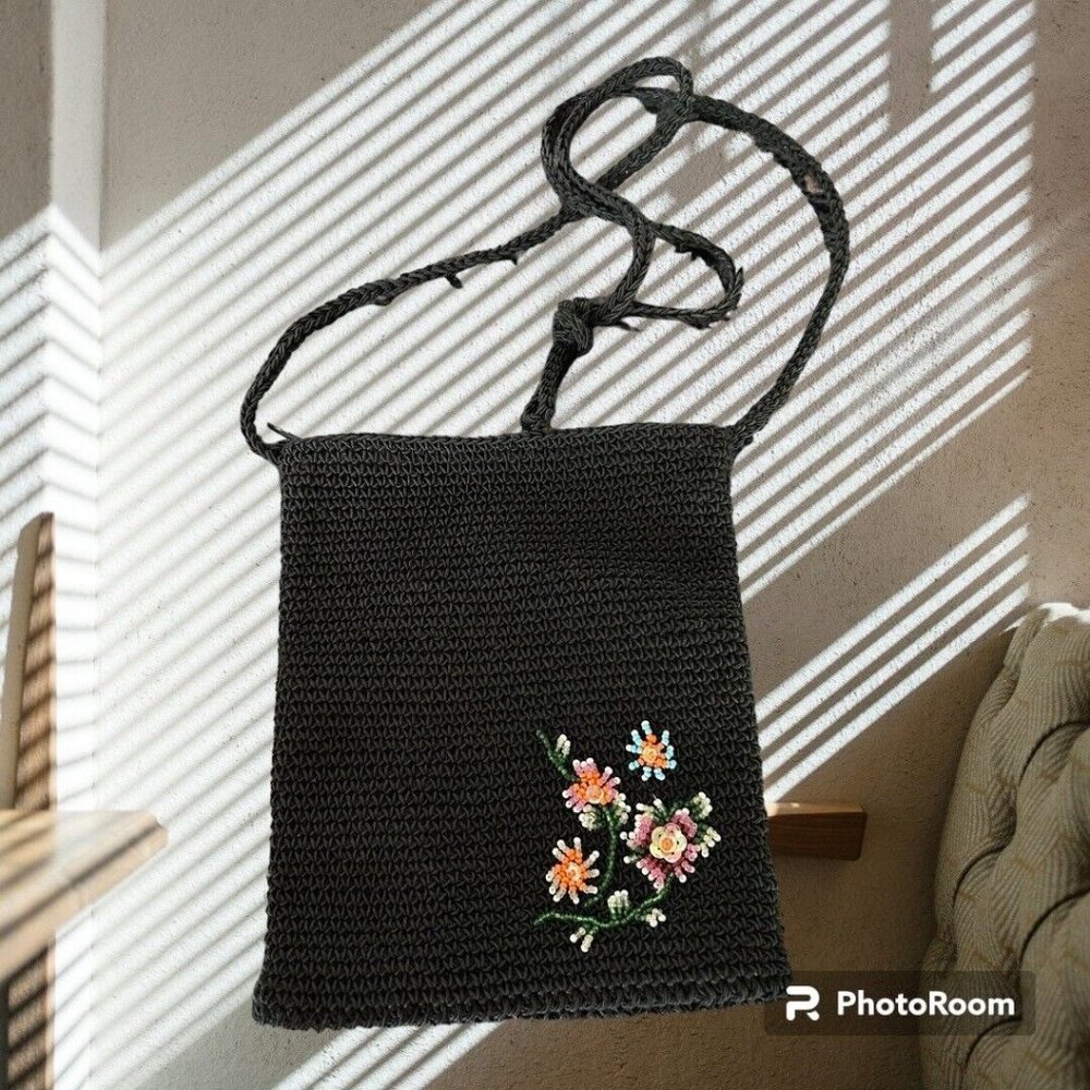 Ladies black woven Crossbody handbag w/beaded flowers on front Zip Closure